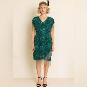 Vintage teal blue beaded and sequined dress. Beaded fringe. Size 8